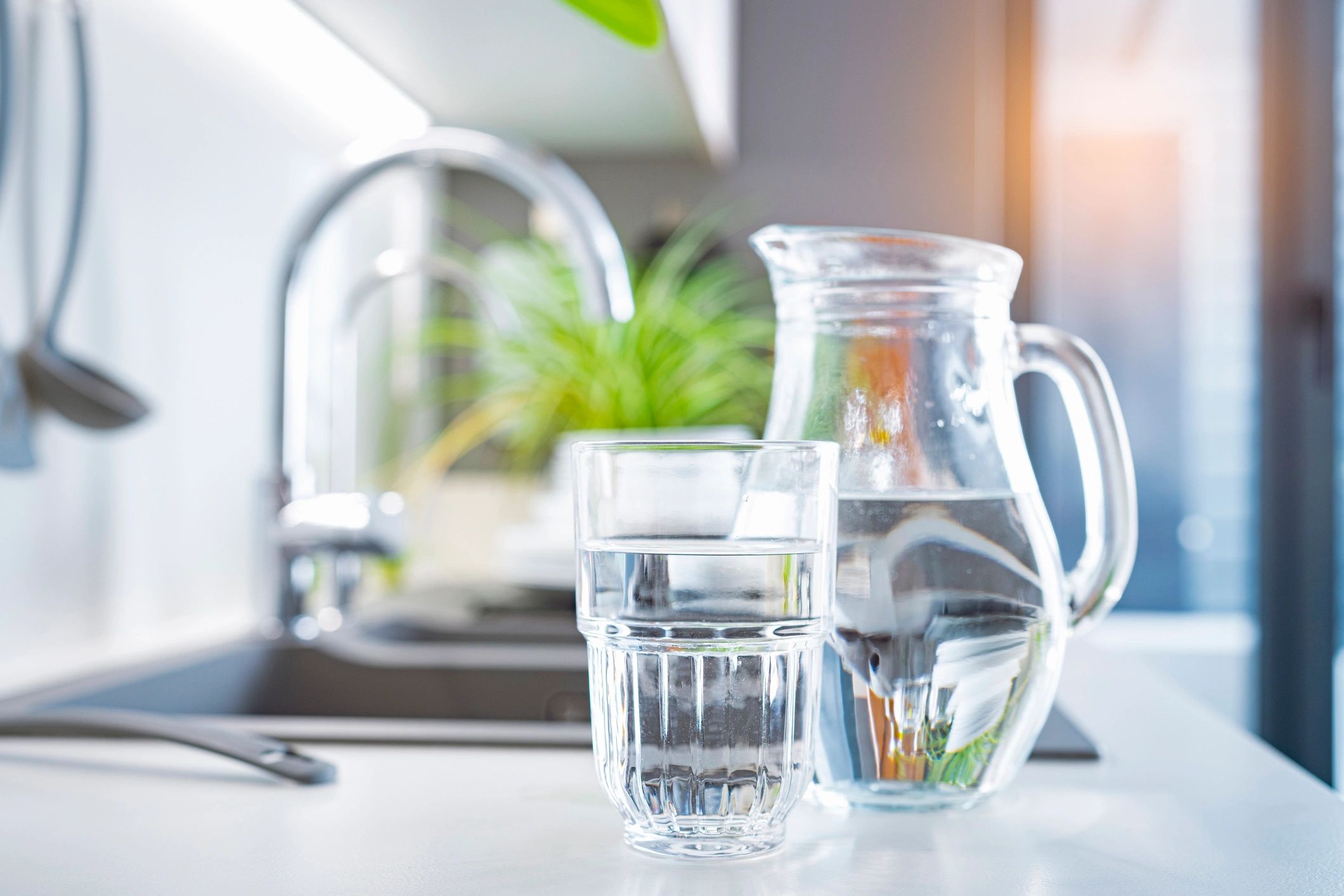 Glass of clean water on a kitchen counter